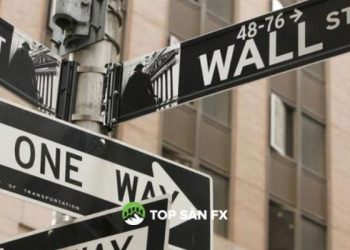 Phố Wall kết thúc cao, Fed chấm dứt việc mua trái phiếu vào tháng 3